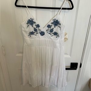 Altard state white dress with adjustable straps and blue floral detailing
